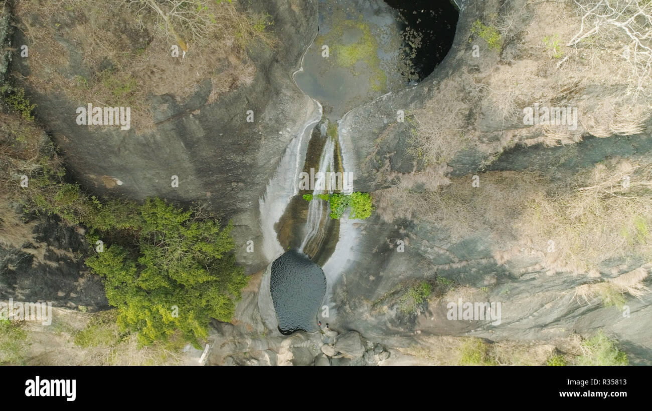 Aerial view of waterfall in the mountains of Filipino cordillera