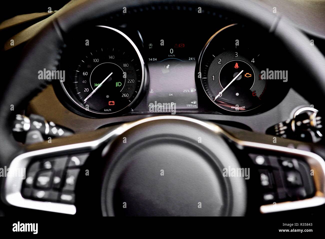 jaguar steering wheel Stock Photo - Alamy