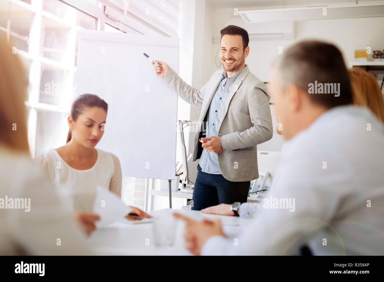 Presentation and collaboration by business people Stock Photo - Alamy