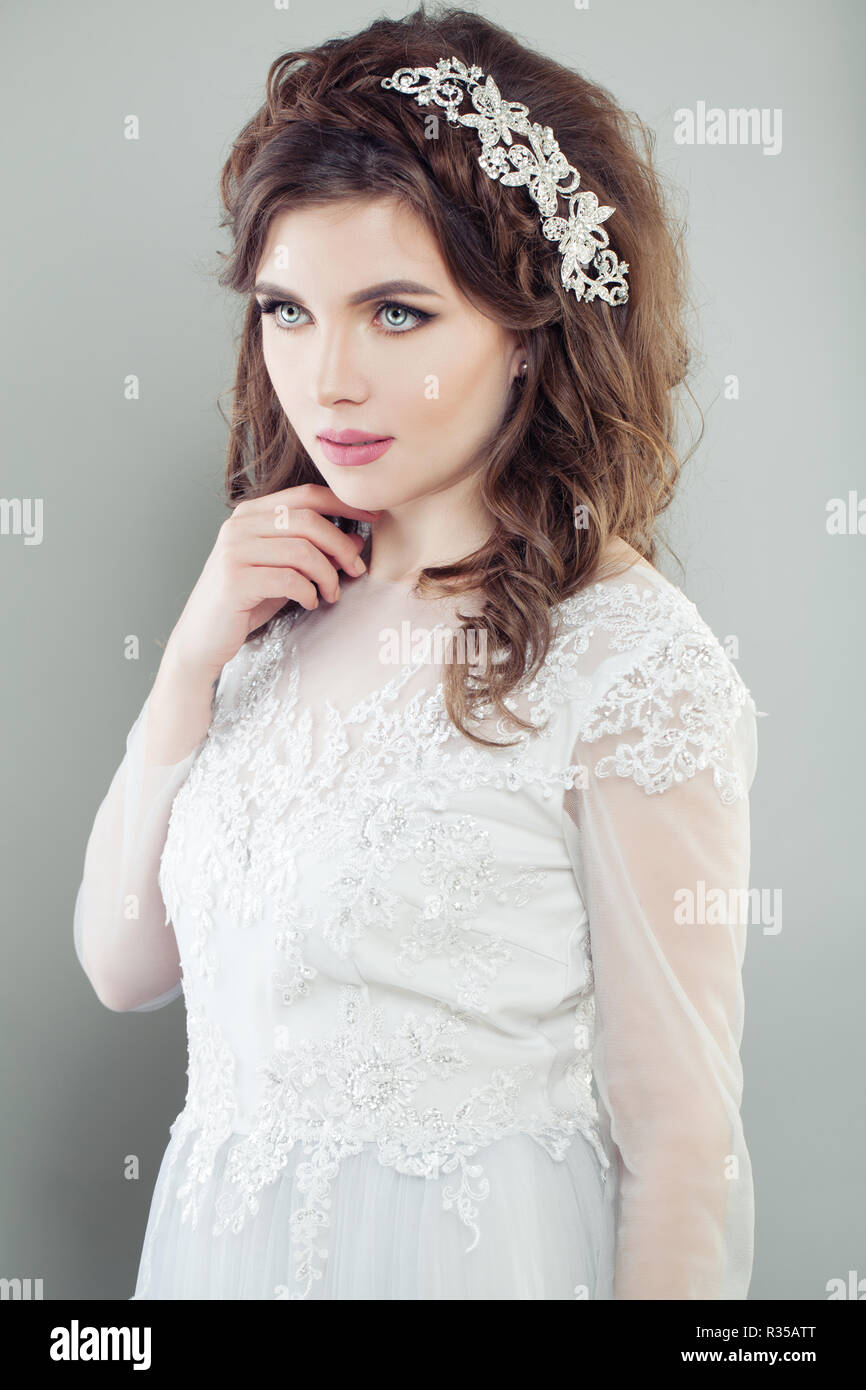 Perfect fashion model bride in white bridal dress. Wedding hair and makeup Stock Photo - Alamy Perfect fashion model bride in white bridal dress. Wedding hair and makeup Stock Photo - Alamy