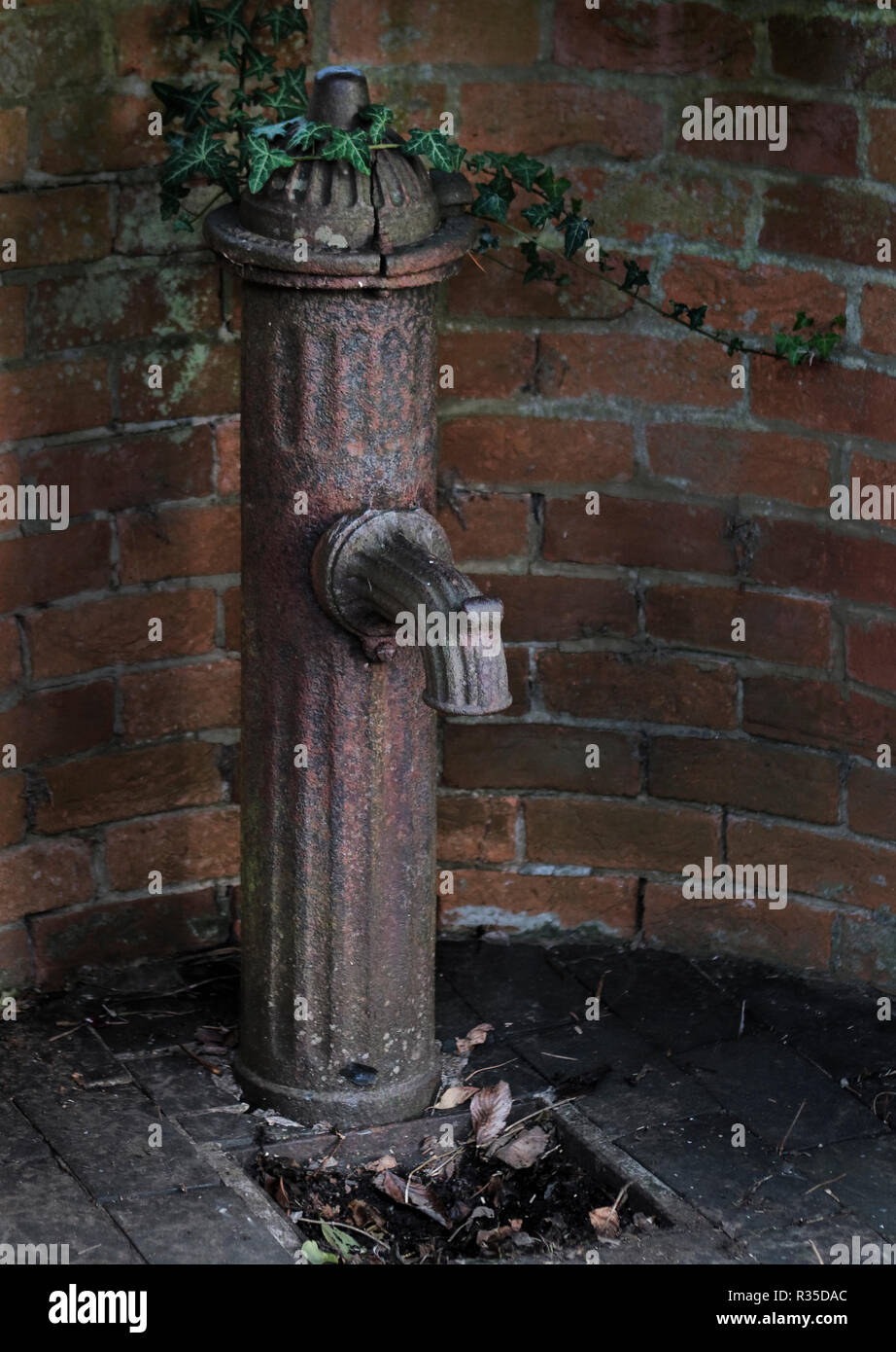 An old cast-iron standpipe in Fyfield, Oxfordshire, UK. Stock Photo