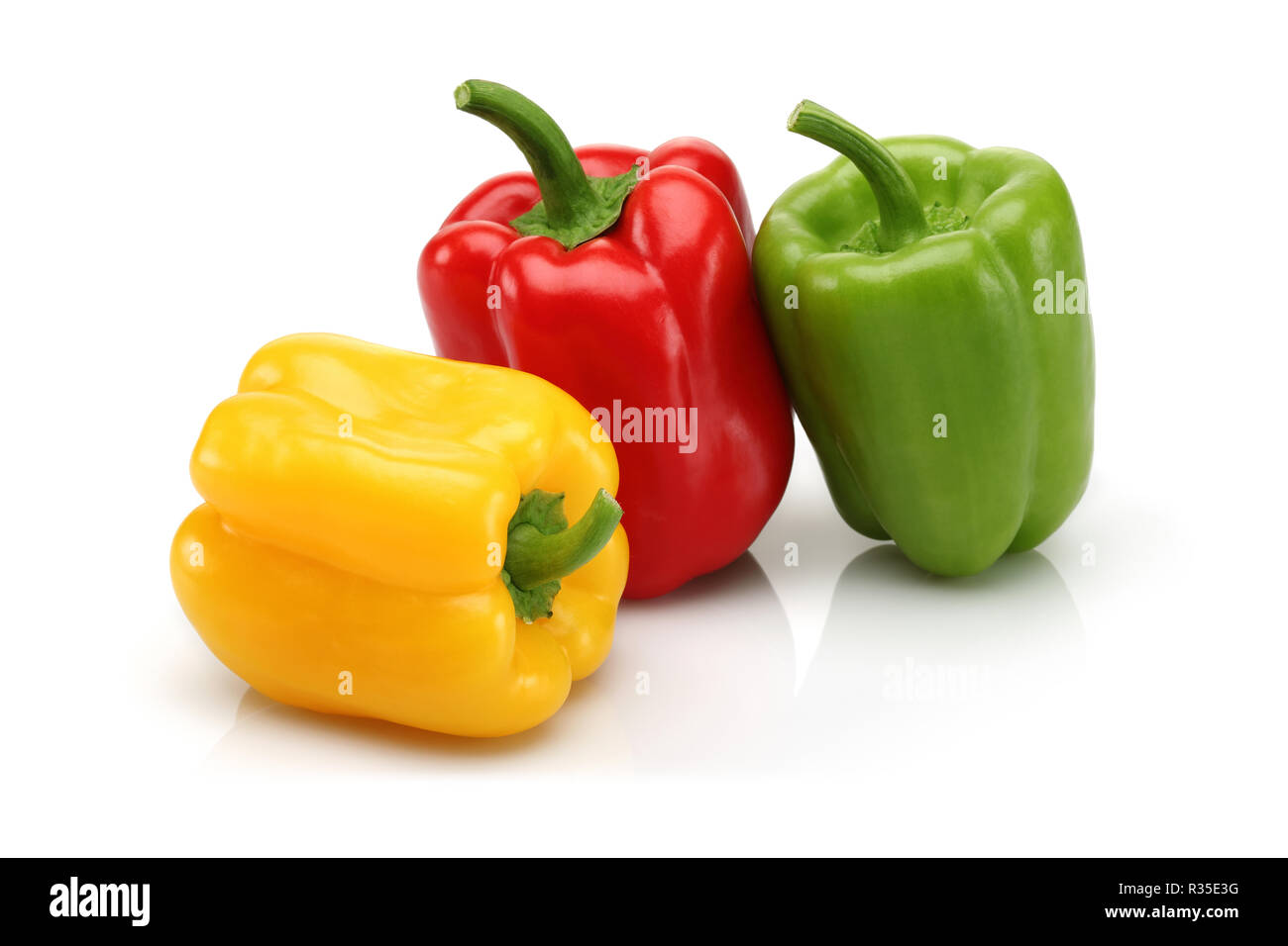 Red, yellow and green bell pepper group Stock Photo