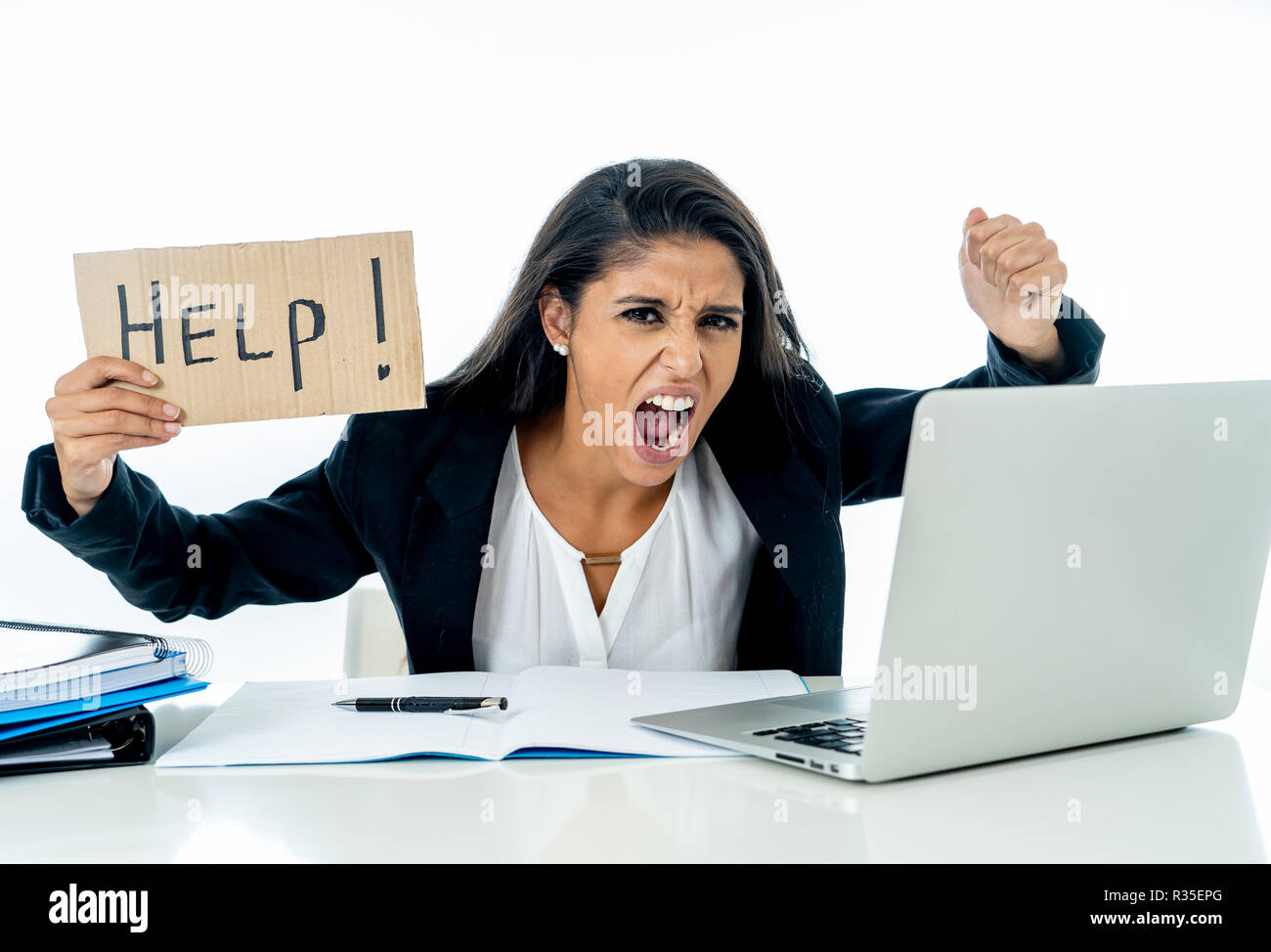 Young attractive businesswoman working on computer laptop suffering ...