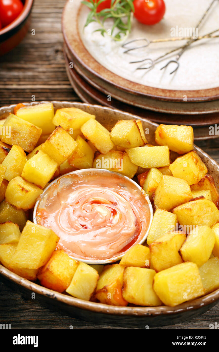 Patatas bravas traditional Spanish potatoes snack tapas Stock Photo - Alamy
