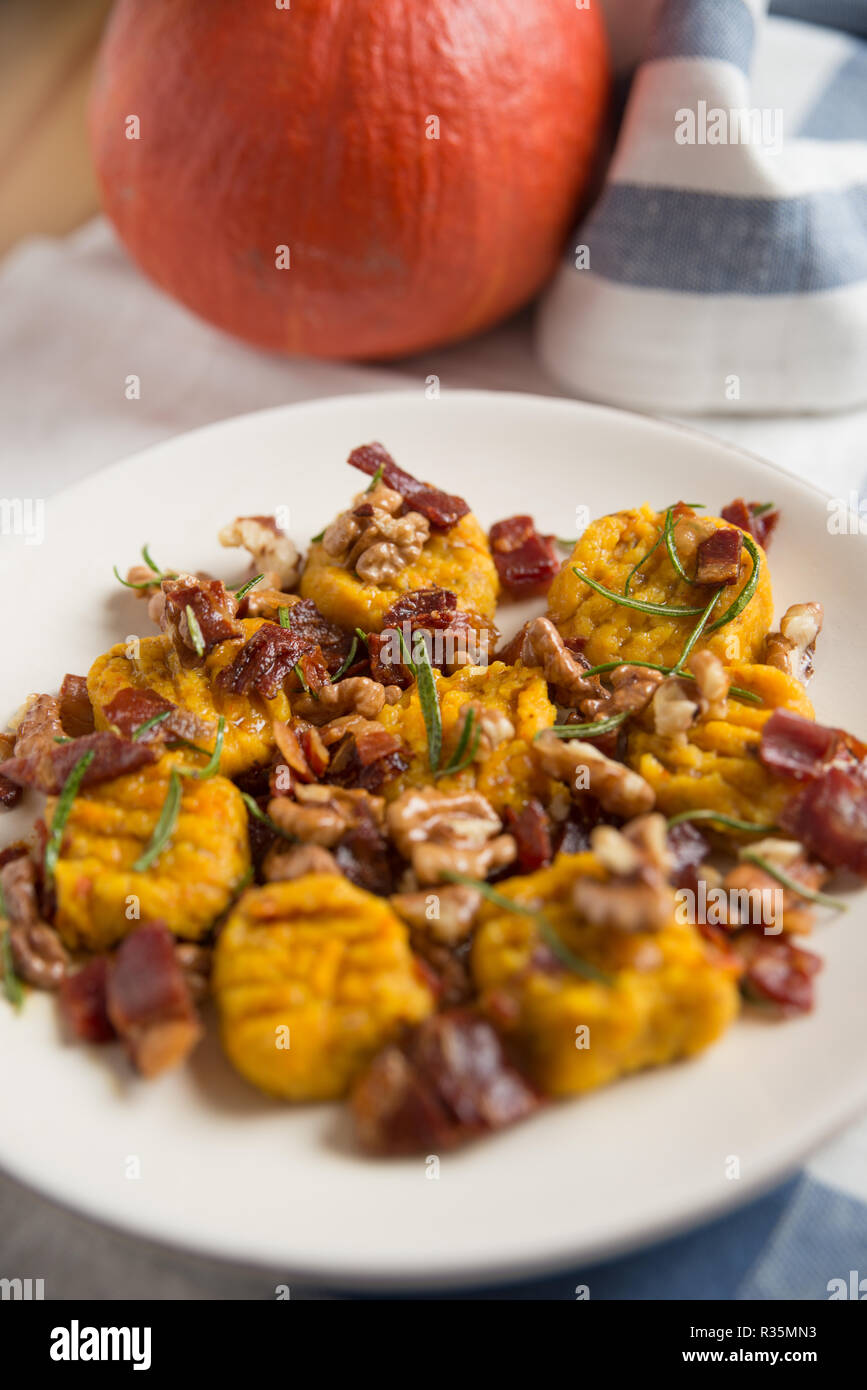 Pumpkin Gnocchi with bacon Stock Photo
