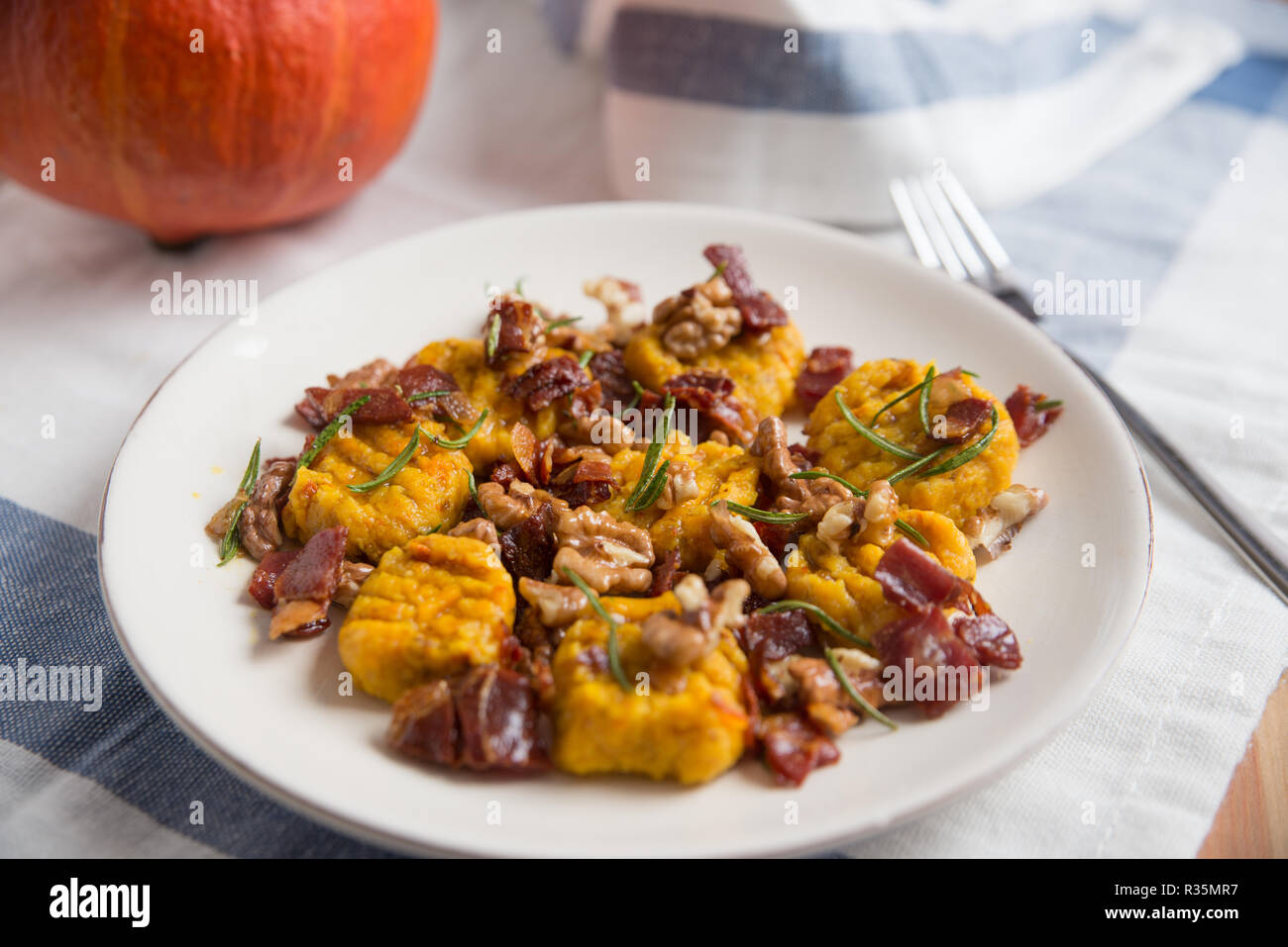 Pumpkin Gnocchi with bacon Stock Photo