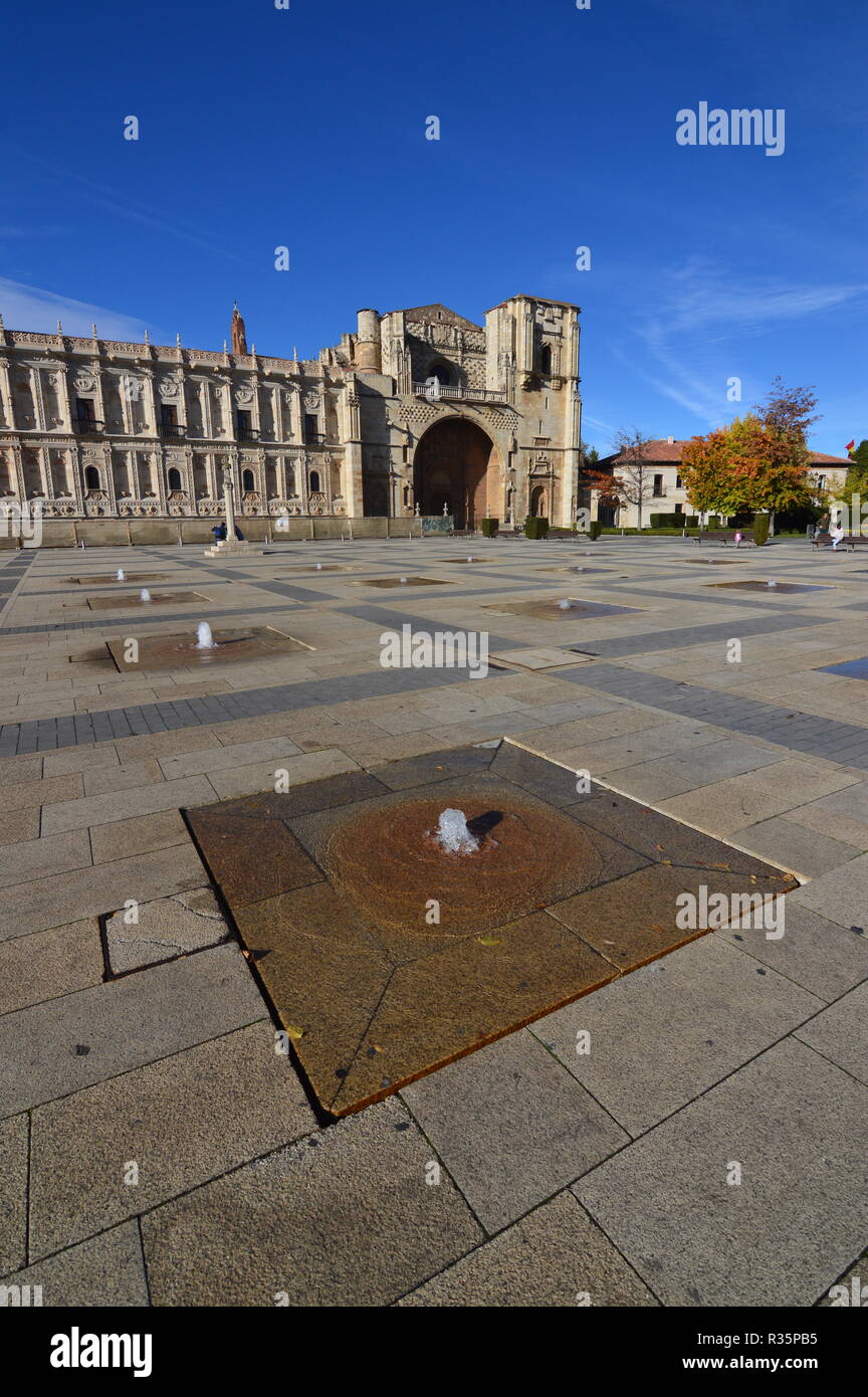 Main Facade Of The Old San Marcos Hospital Convent With A Fountain In The Foreground In Leon. Architecture, Travel, History, Street Photography. Novem Stock Photo