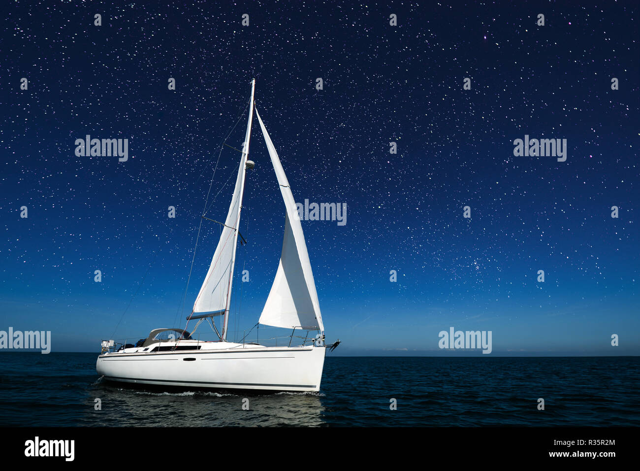 sailboat under blue sky Stock Photo