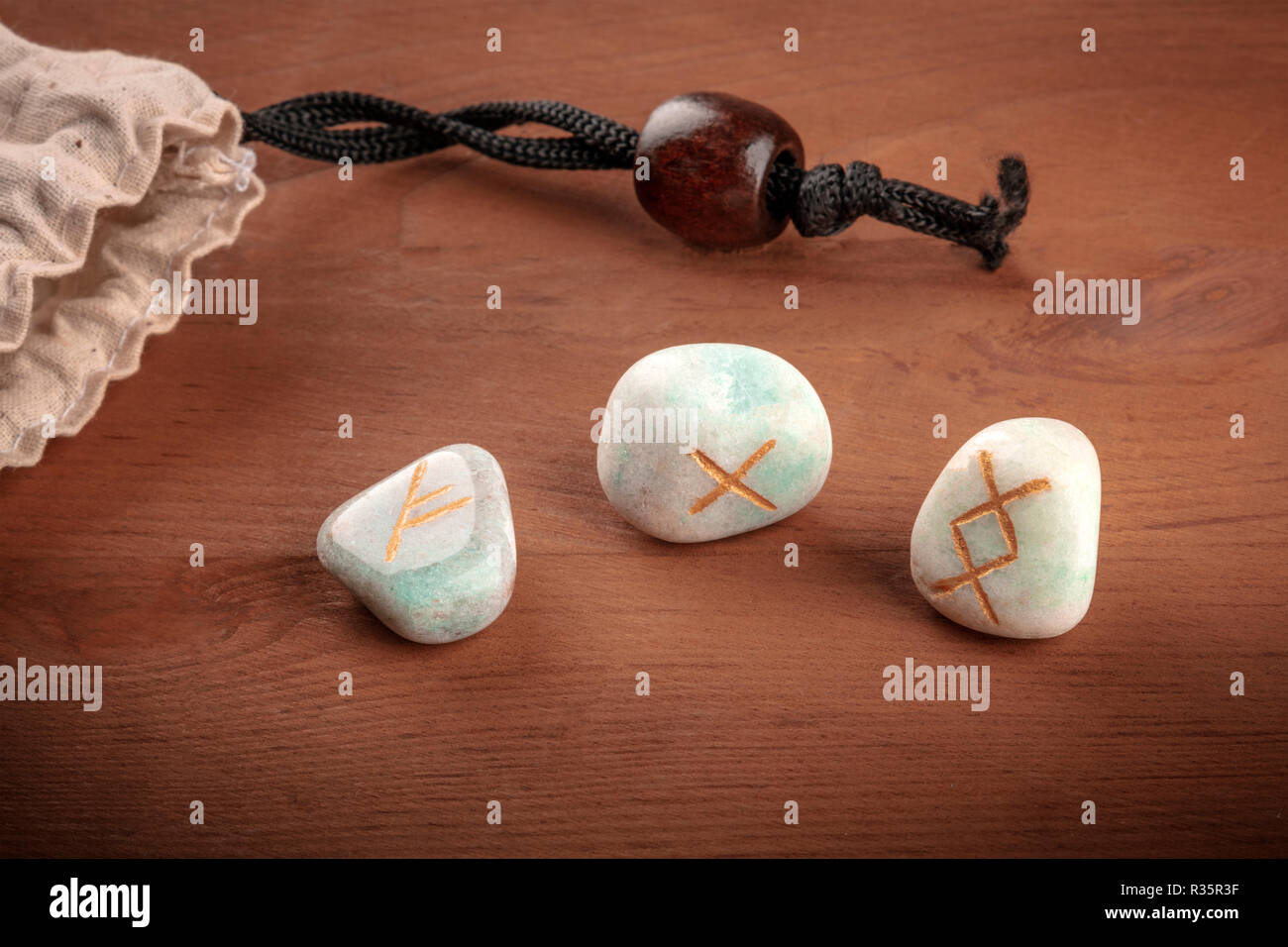 Three rune stones an ancient oracle the Viking runes An ancient alphabetic  script Stock Photo - Alamy