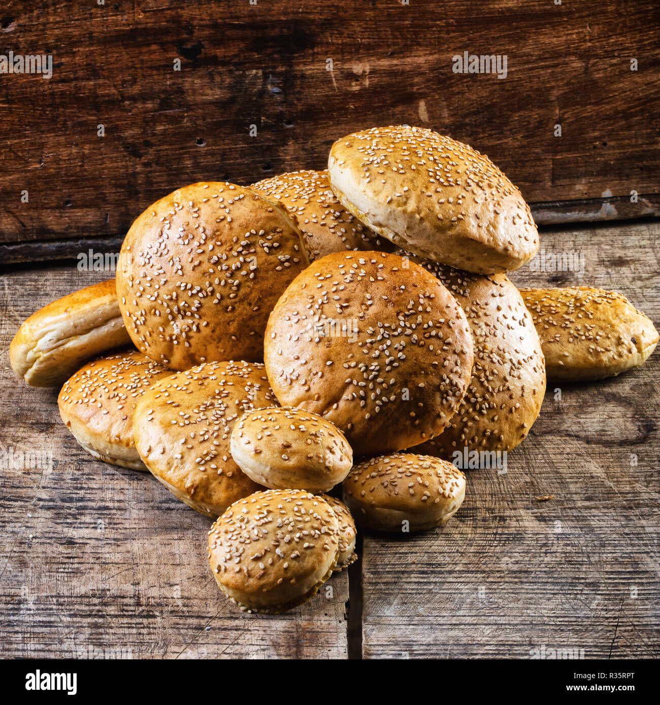 Hamburger bun on a wooden table Stock Photo