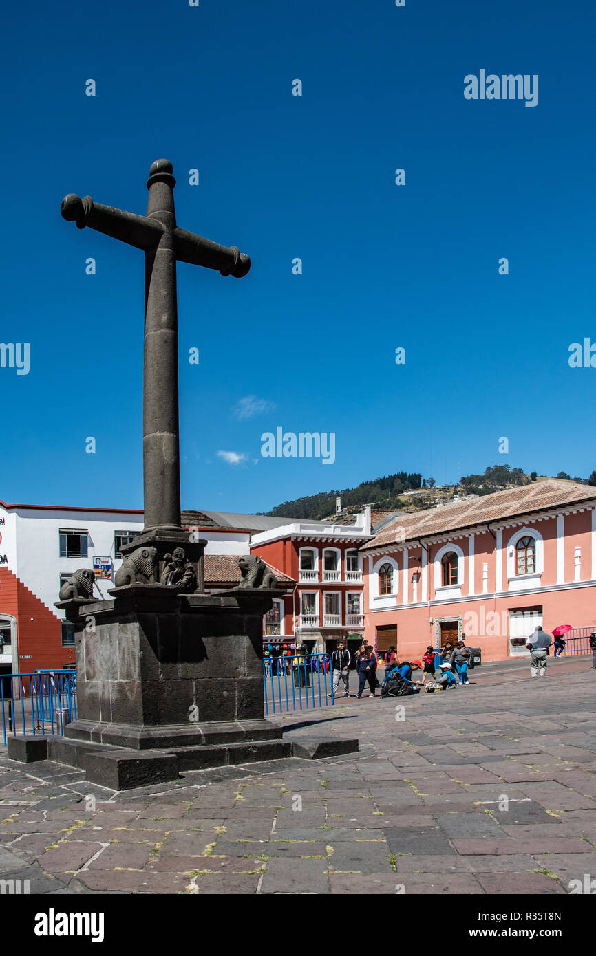 In all the squares of Quito there is a large crucifix that recalls the colonial era, Ecuador Stock Photo