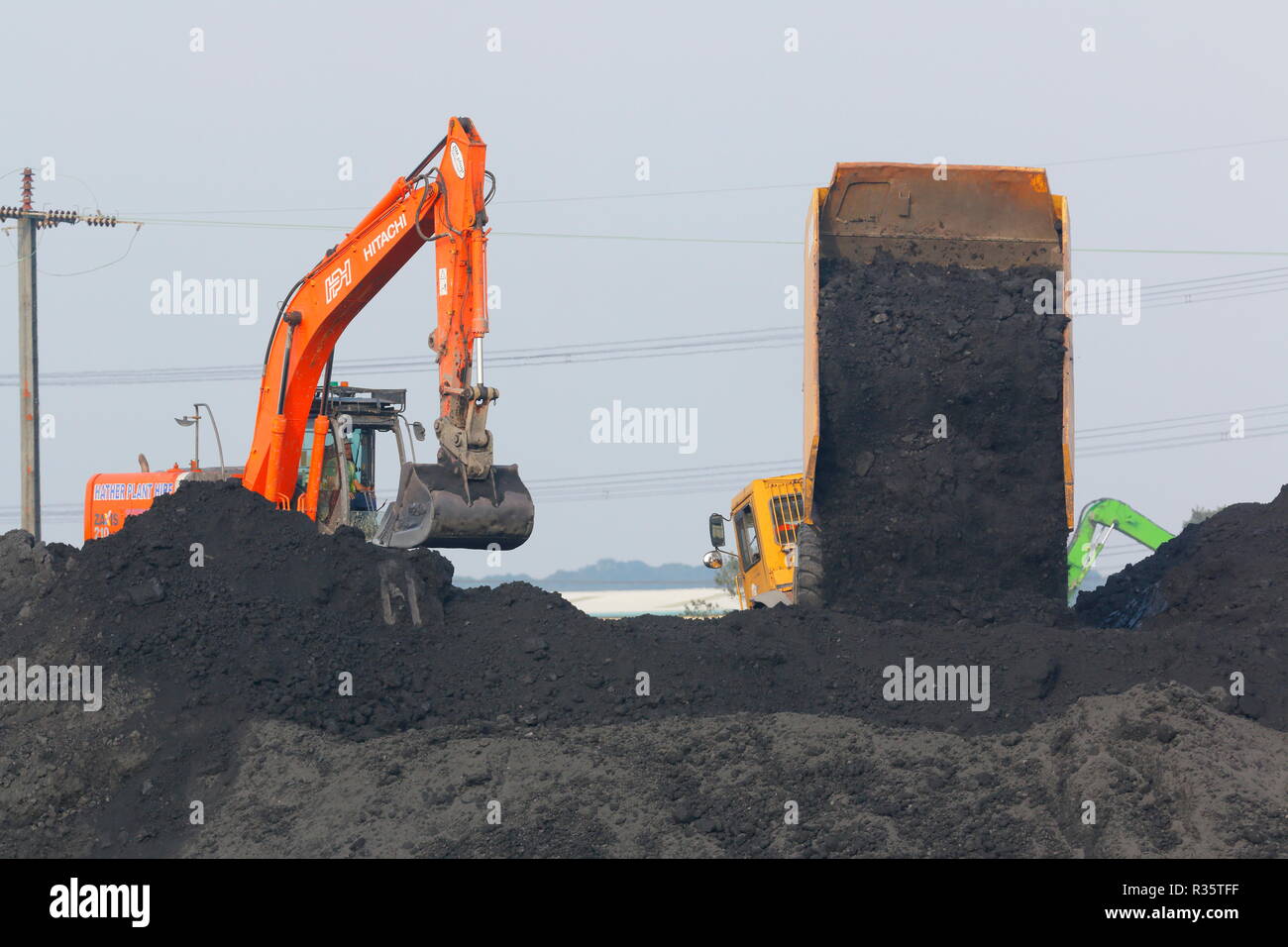 Machines working on the old Recycoal coal recycling plant in Rossington,Doncaster which has now been demolished to make way for new homes. Stock Photo