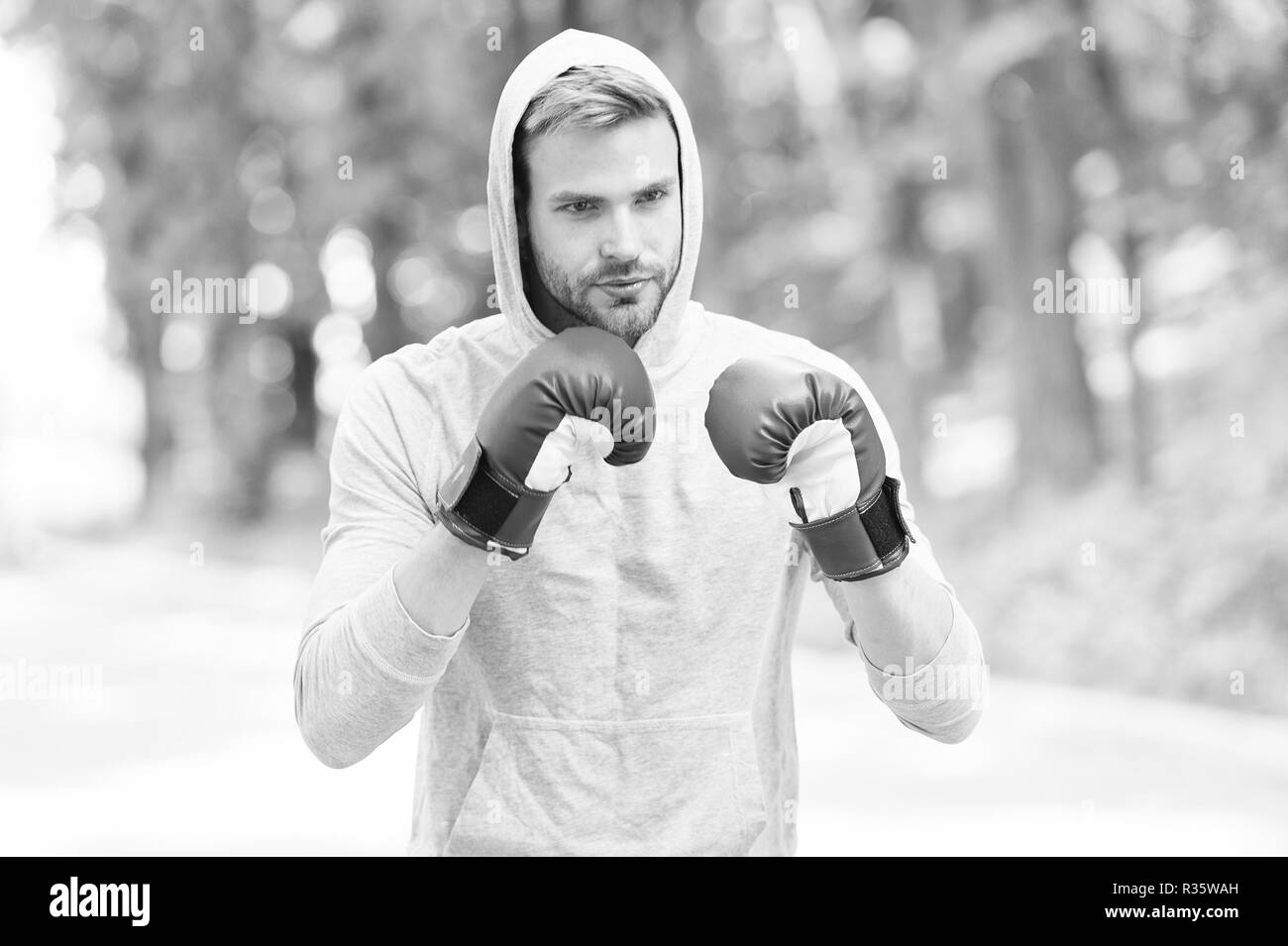 Training for big day. Man athlete on concentrated face with sport