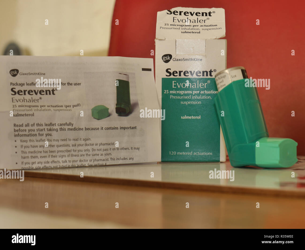 Serevent(r) inhaler. Shot shows box, instruction leaflet and evohaler containing salmeterol for asthma and copd relief,Long lasting. Stock Photo
