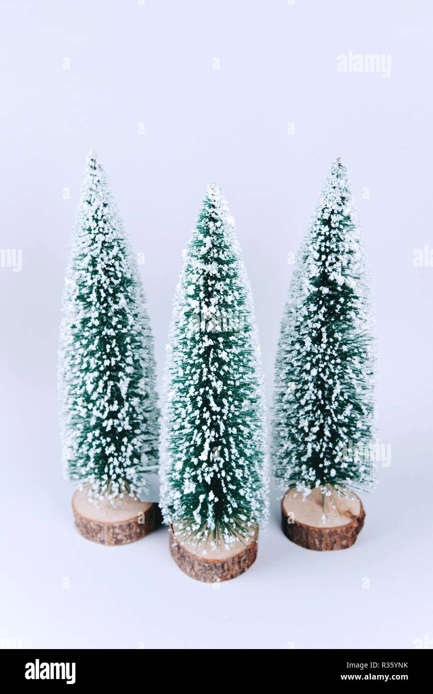 Christmas tree over light blue background Stock Photo - Alamy