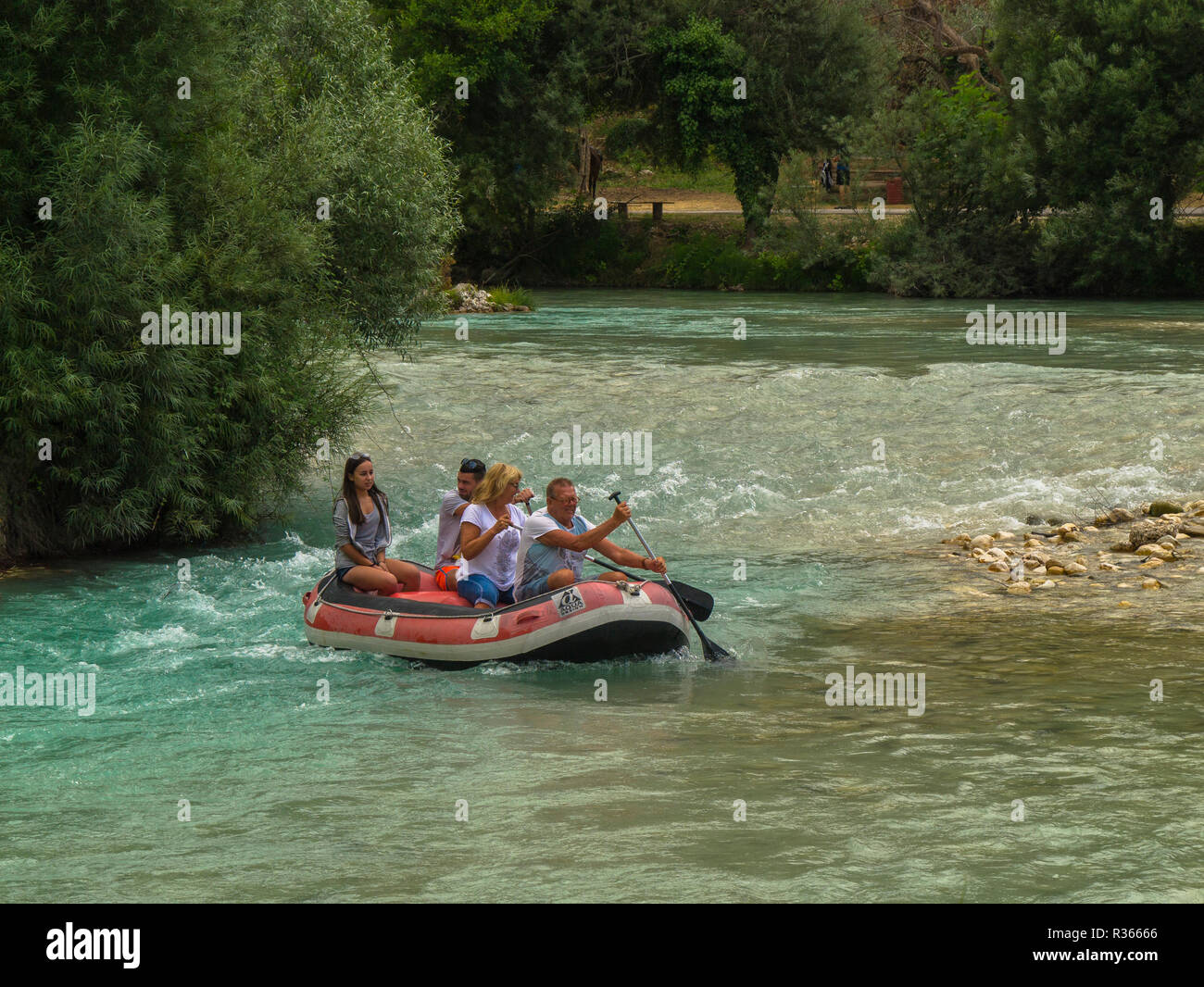 Tourists White water rafting on the River Acheron without life jackets Preveza region,Epirus Zaloggo,Greece Stock Photo