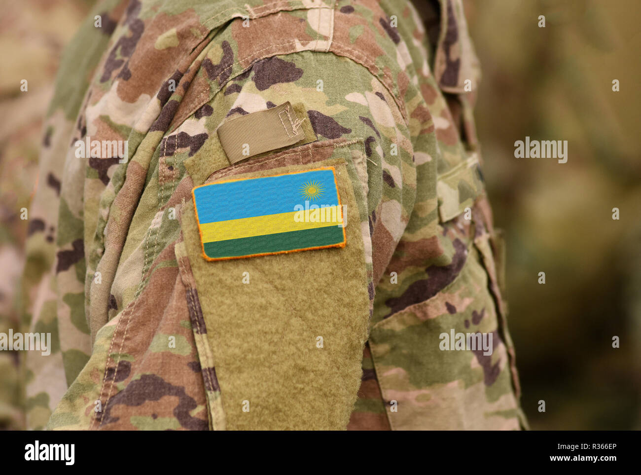 Rwanda flag on soldiers arm. Rwanda troops (collage) Stock Photo