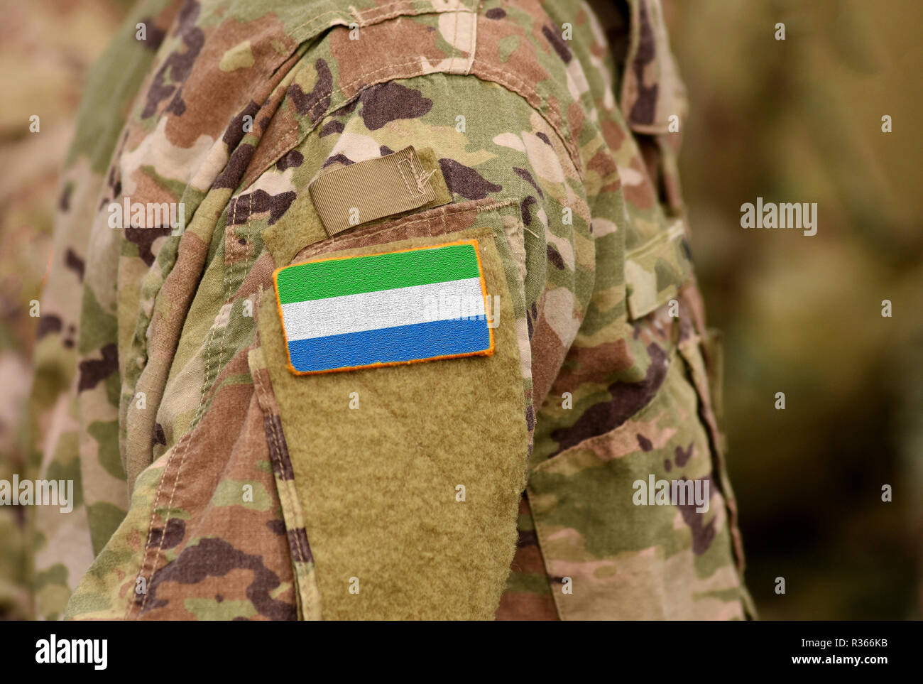 Sierra Leone flag on soldiers arm. Sierra Leone troops (collage) Stock Photo