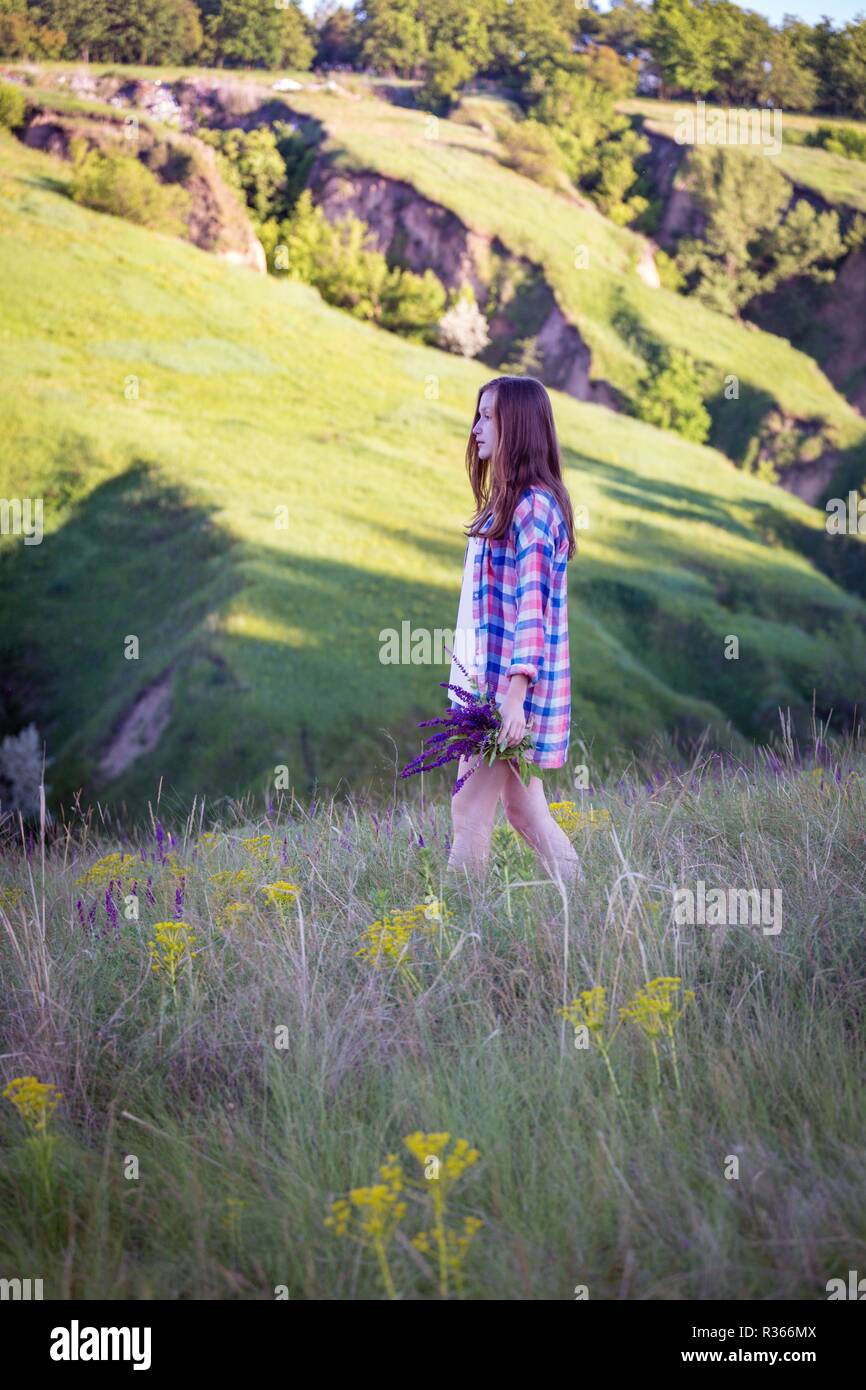 summer - Girl teenager on a meadow Stock Photo - Alamy