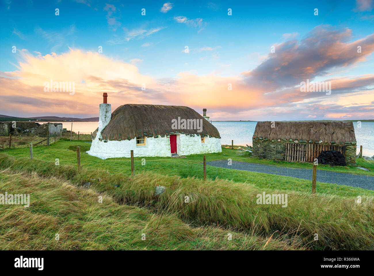 A thatched croft at Malaclate on the Isle of Uist in the Outer Hebrides Stock Photo
