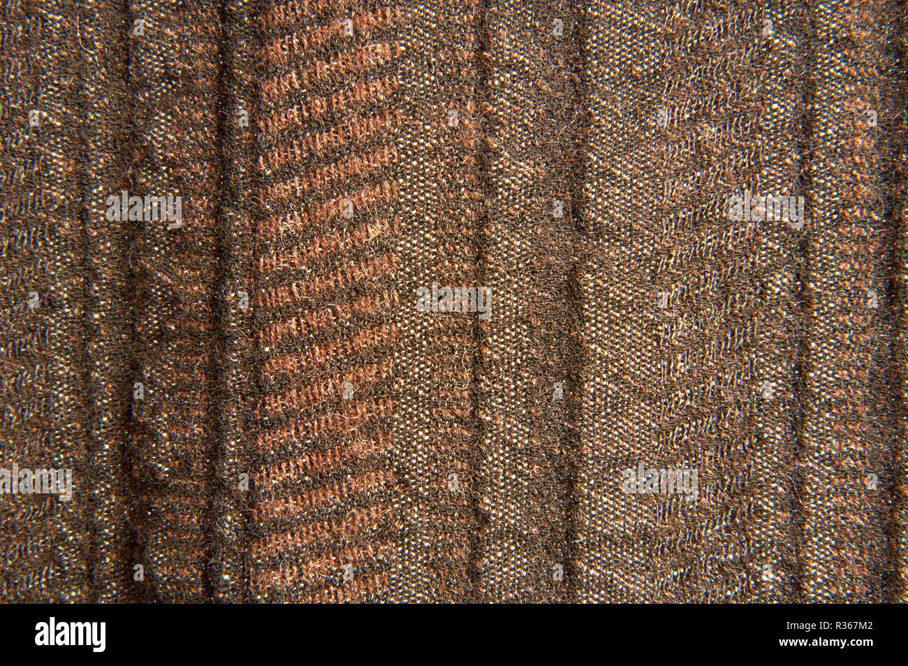 Brown knitted fabric textile texture close up Stock Photo