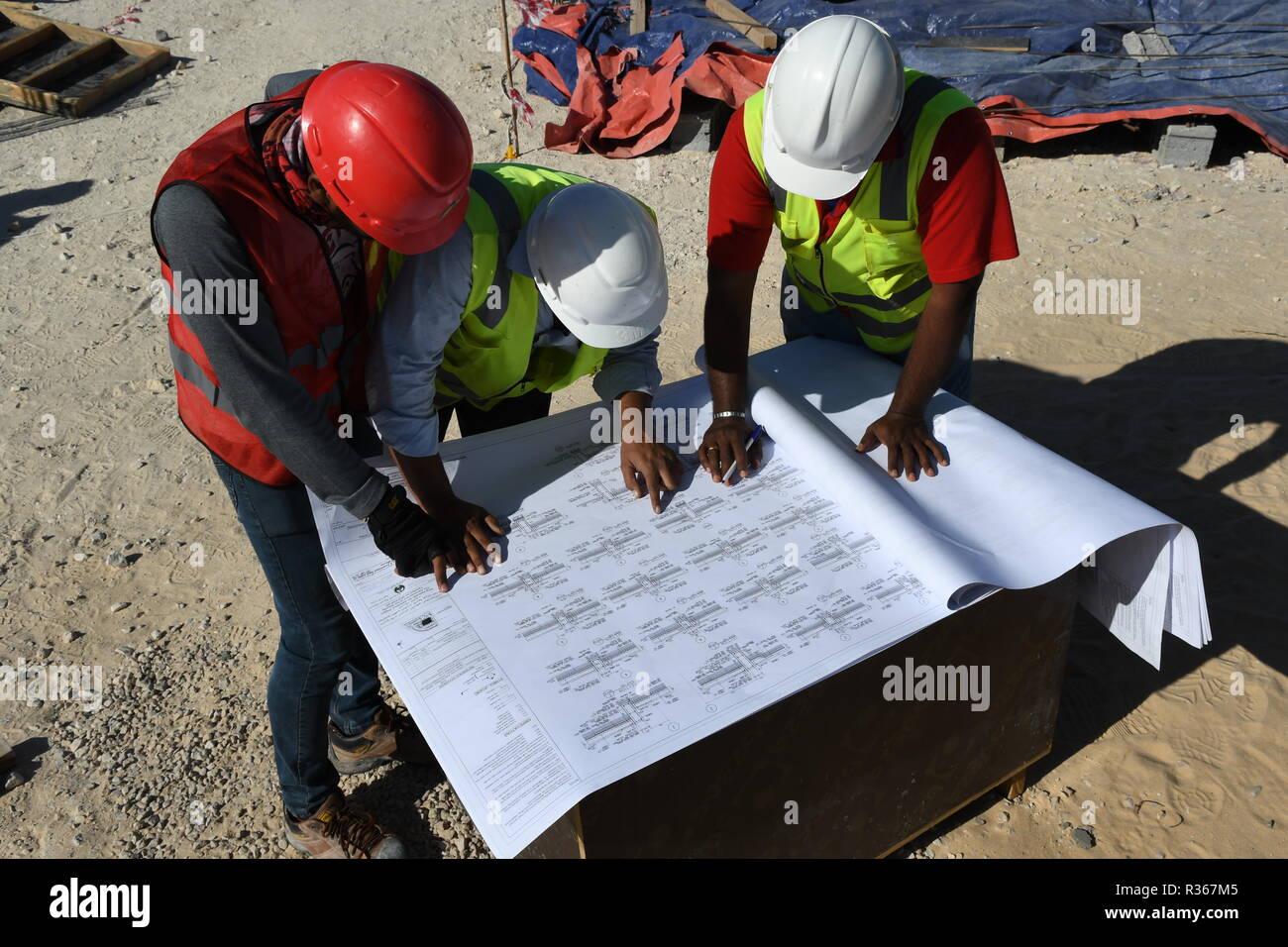 Skilled Engineers are doing daily Work Inspections to make sure the work has no problems Stock Photo
