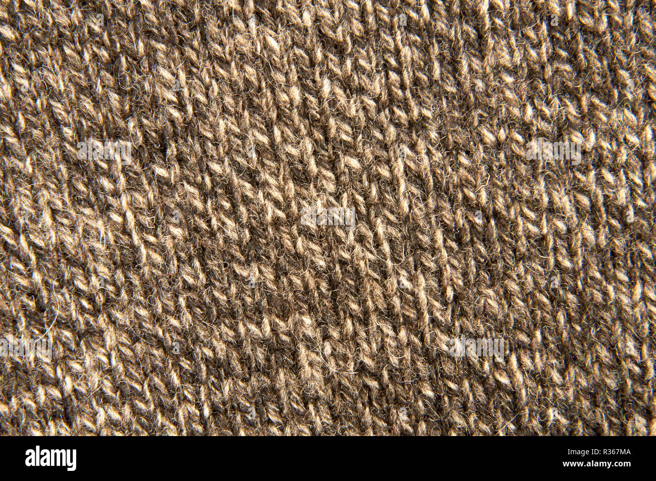 Brown knitted fabric textile texture close up Stock Photo