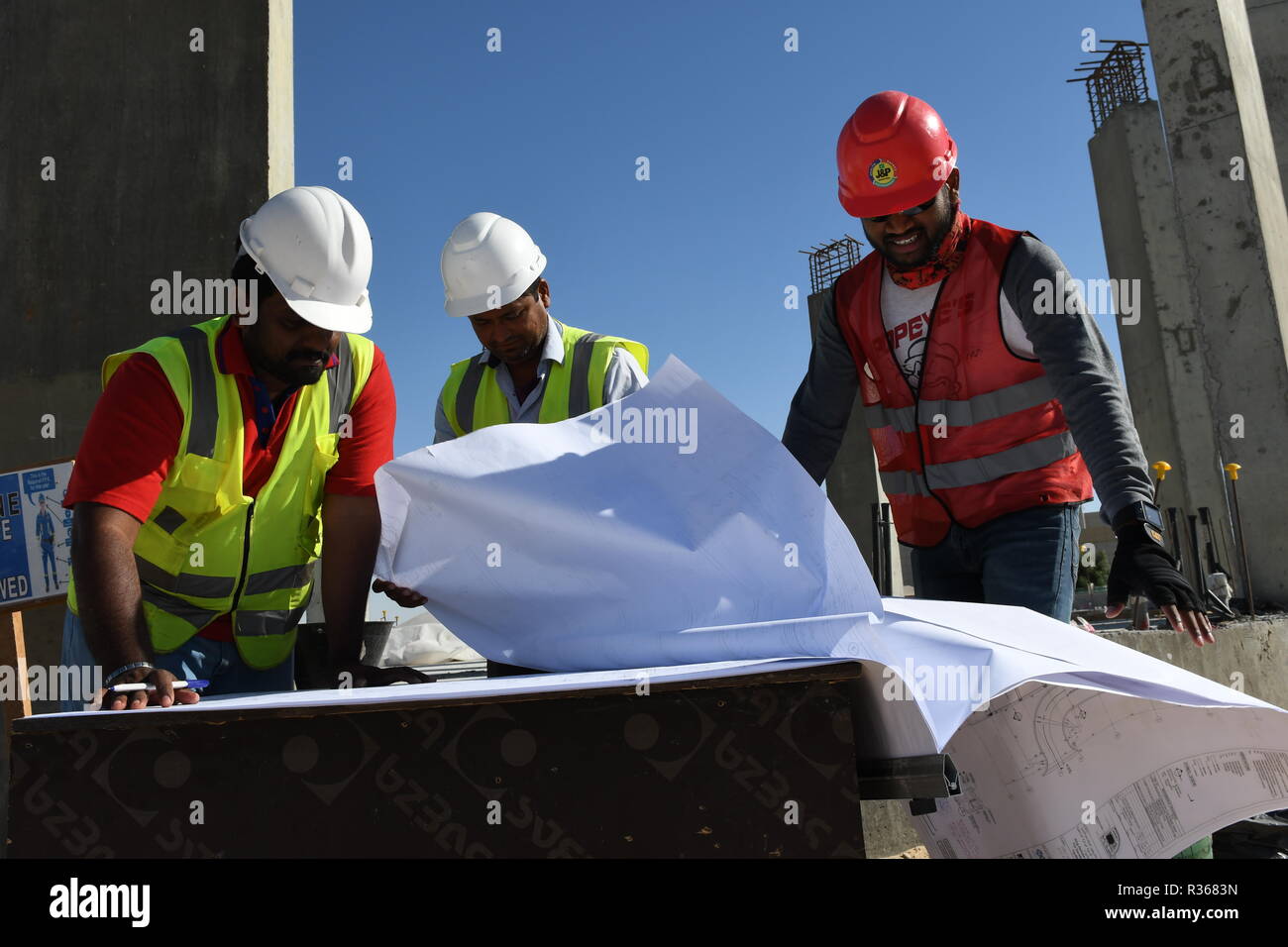 Skilled Engineers are doing daily Work Inspections to make sure the work has no problems Stock Photo