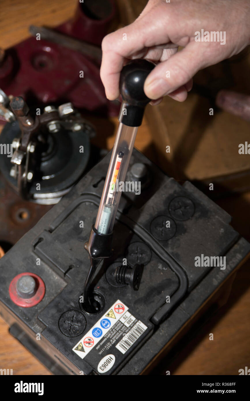Battery hydrometer being used on 12 volt car battery Stock Photo Alamy