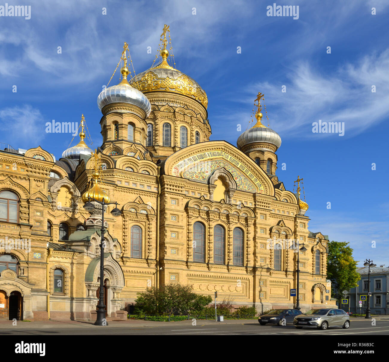 Orthodox Church of Dormition of Mother of God stands towering on Vasilievsky Island, at mouth of Neva River Stock Photo