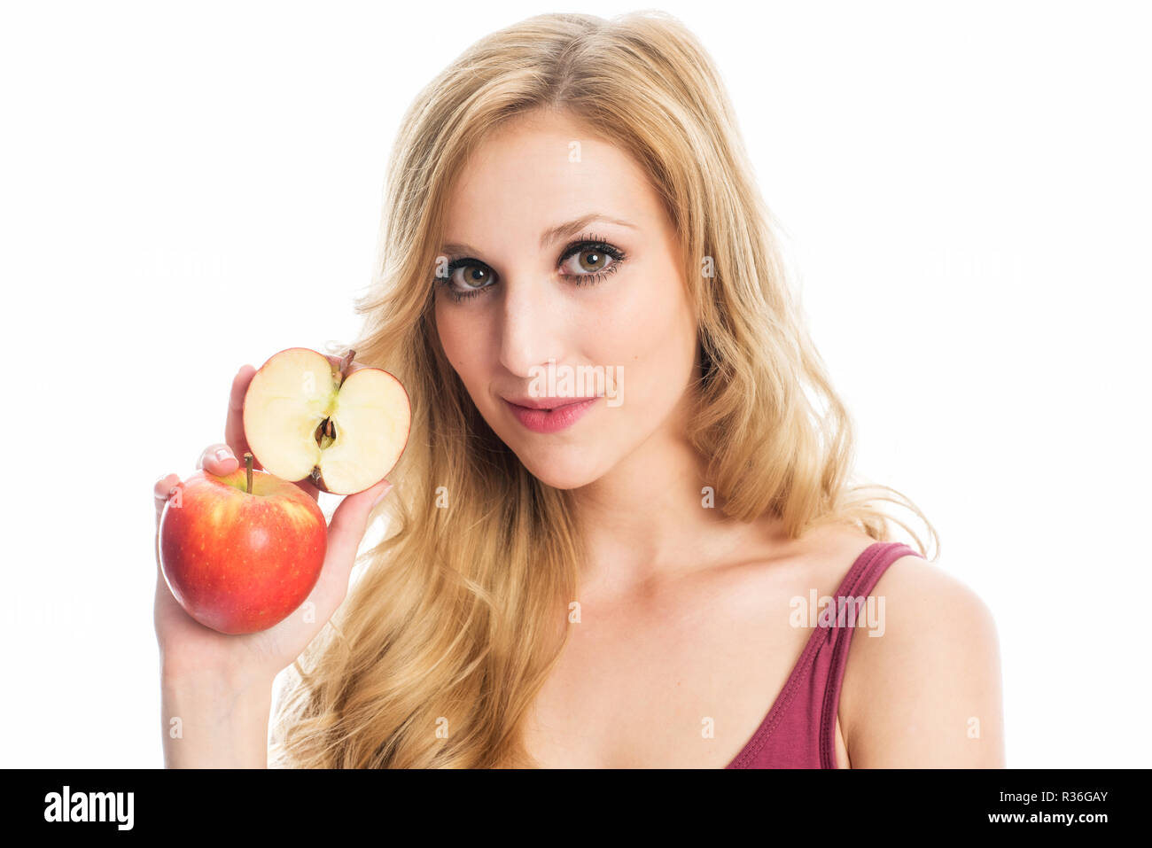 woman is holding an apple Stock Photo
