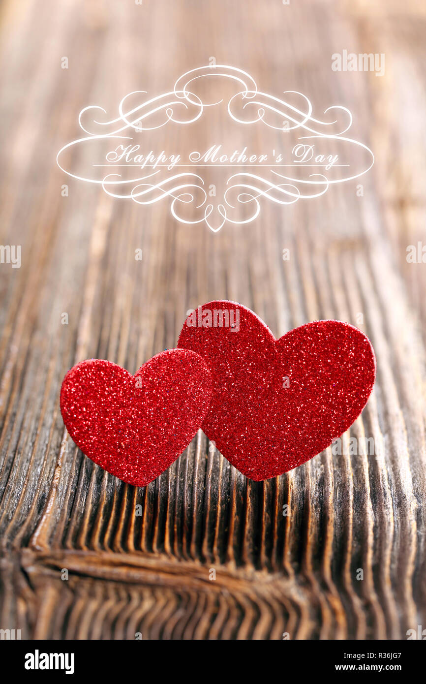 two red hearts on wooden background with inscription I love you Mom Stock  Photo - Alamy