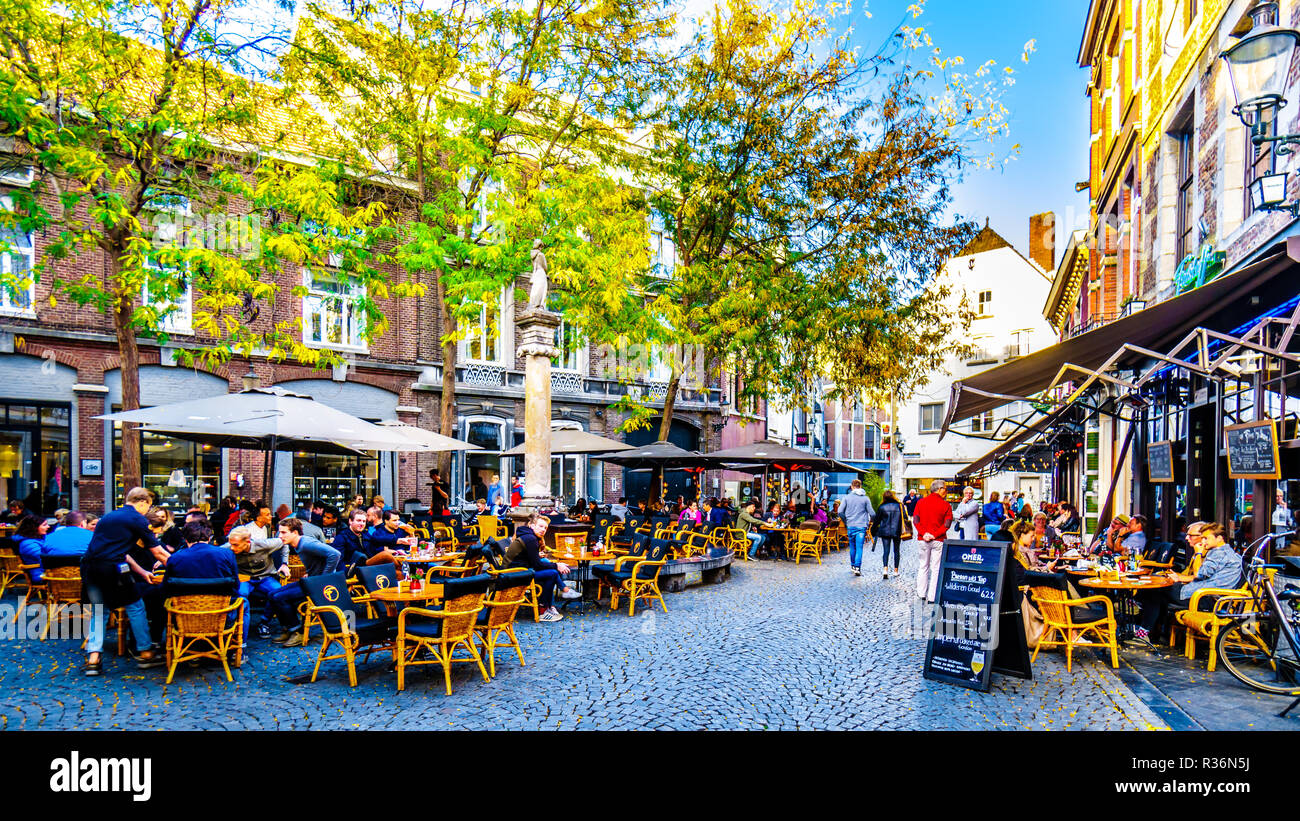 Many restaurant and Pub terraces and patios to hang out with friends in the center of the historic city of Maastricht in the Netherlands Stock Photo