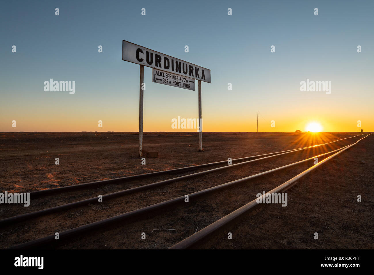 Sun is setting at historic Curdimurka Siding part of the Old Ghan Heritage trail. Stock Photo