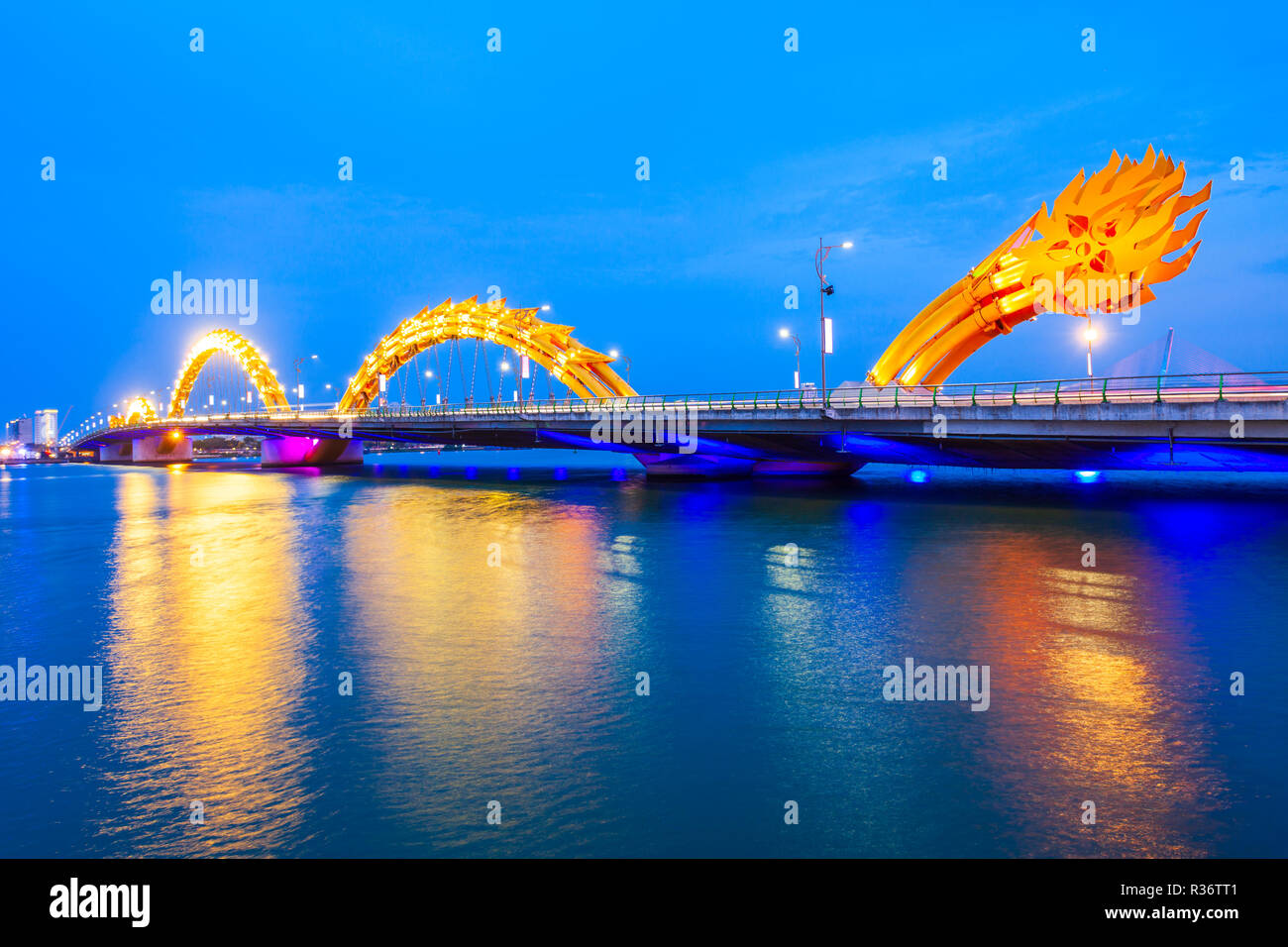 Danang Dragon bridge through Han river in Da Nang city in Vietnam Stock Photo