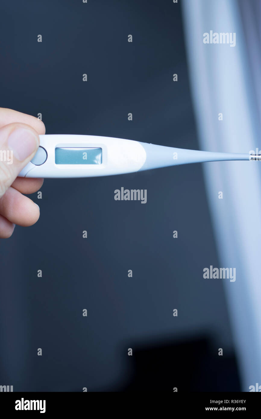 Digital thermometer showing high temperature Stock Photo - Alamy