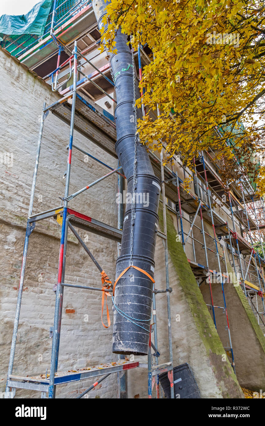 Rubble chute at a construction site in Germany Stock Photo