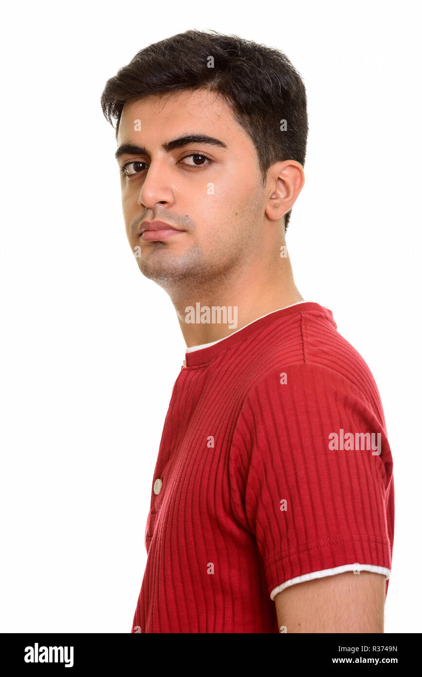 Young handsome Persian man looking at camera Stock Photo Alamy