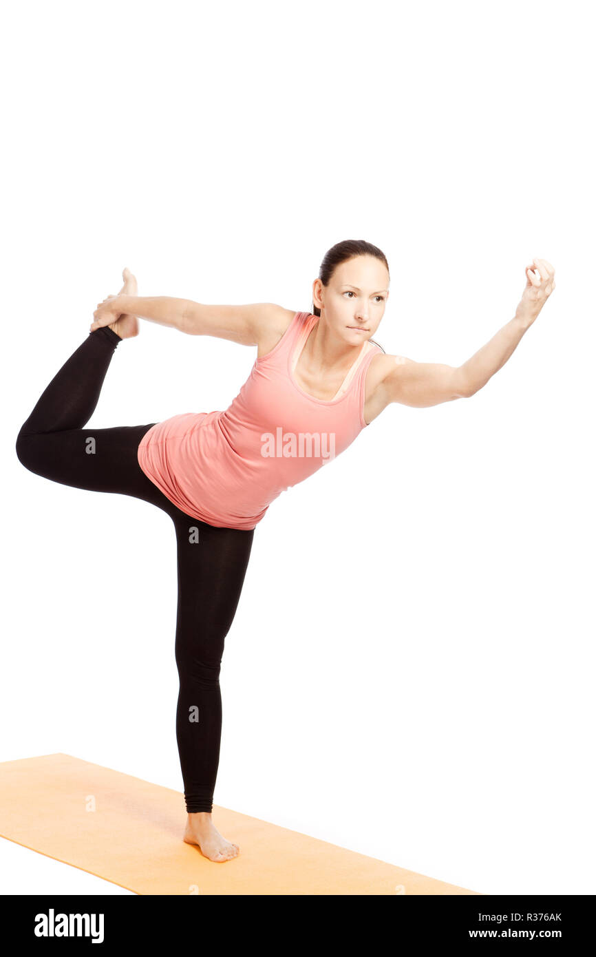Portrait Of Attractive Happy Young Woman Working Out Indoors, Doing Yoga  Exercise, Variation Of Natarajasana, Lord Of The Dance, King Dancer Or  Standing Mermaid Pose, Copy Space Stock Photo, Picture and Royalty