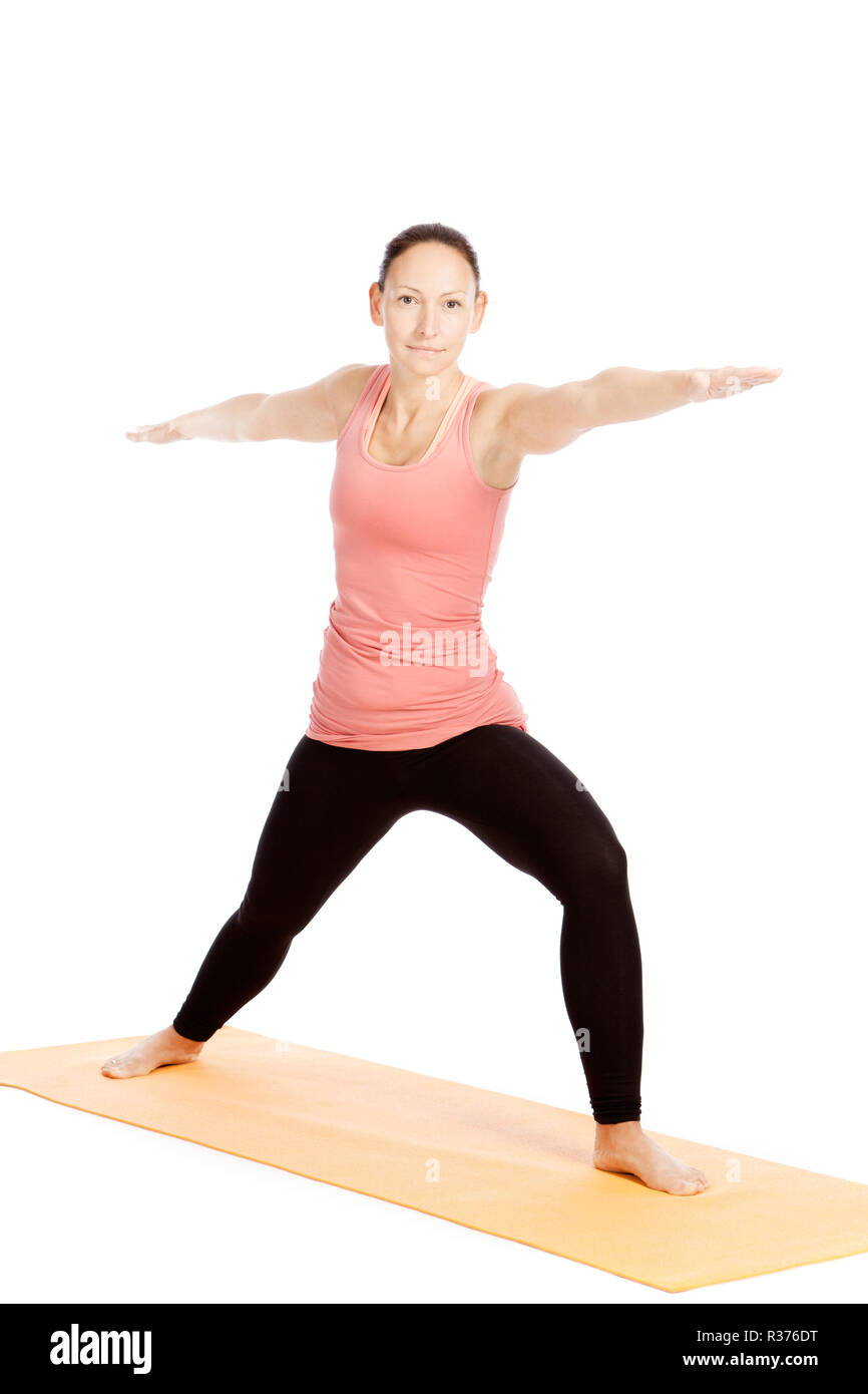 yoga exercise on the mat,virabhadrasana ii Stock Photo Alamy