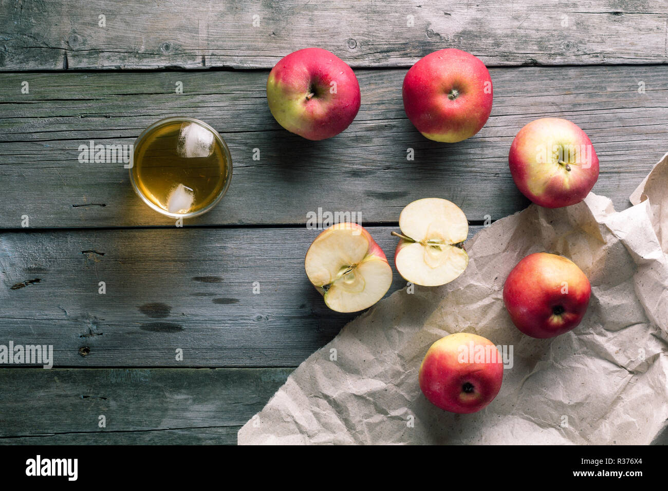 Some apples and a glass of fresh juice Stock Photo