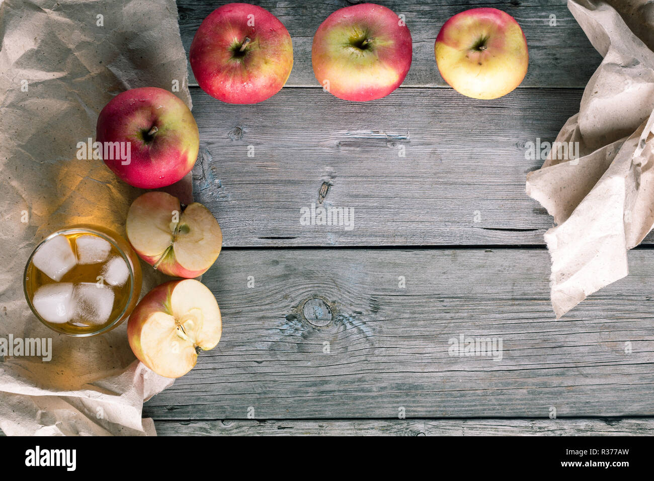 Some apples and a glass of fresh juice Stock Photo