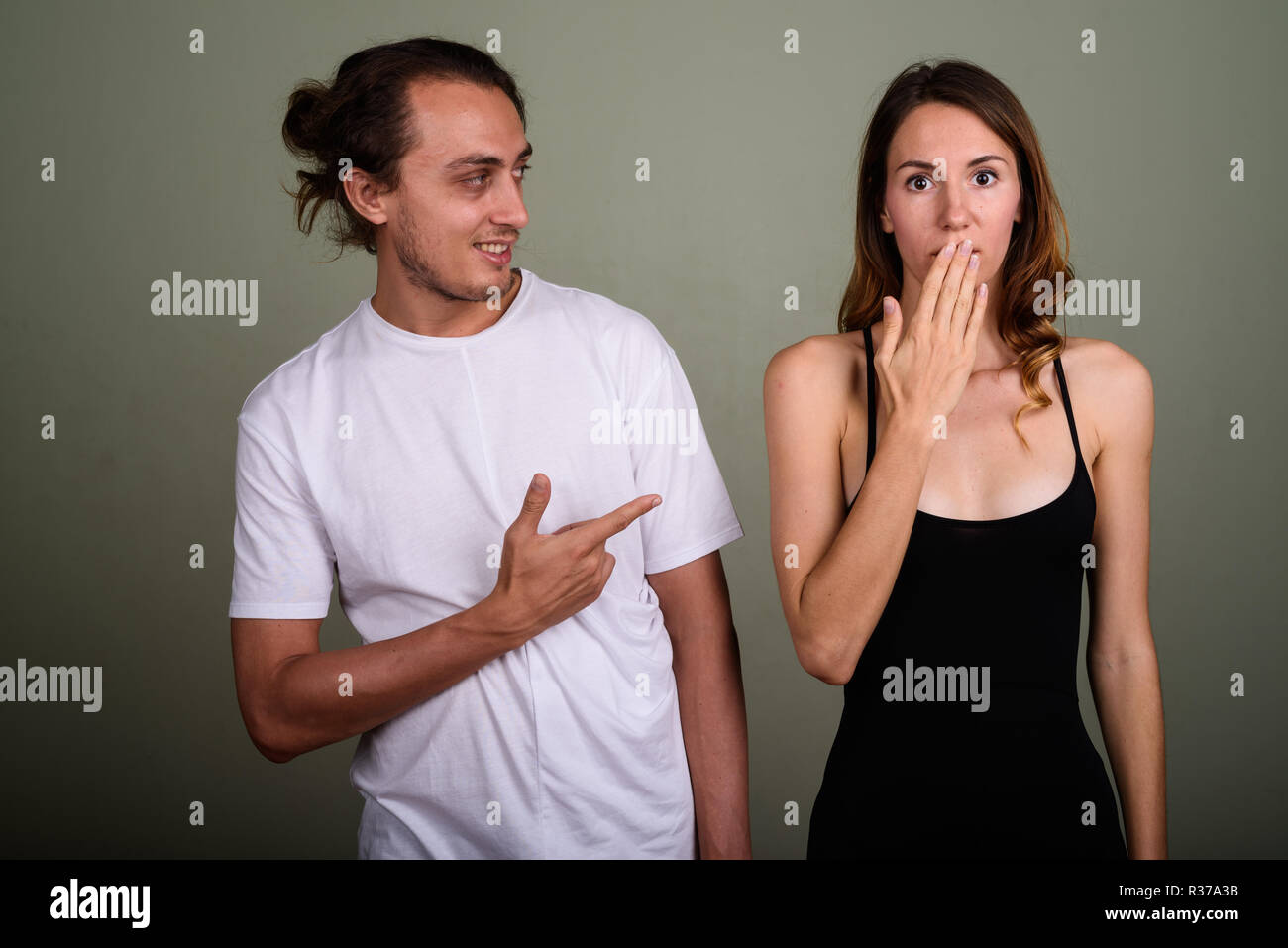 Man covering happy woman hi-res stock photography and images - Alamy