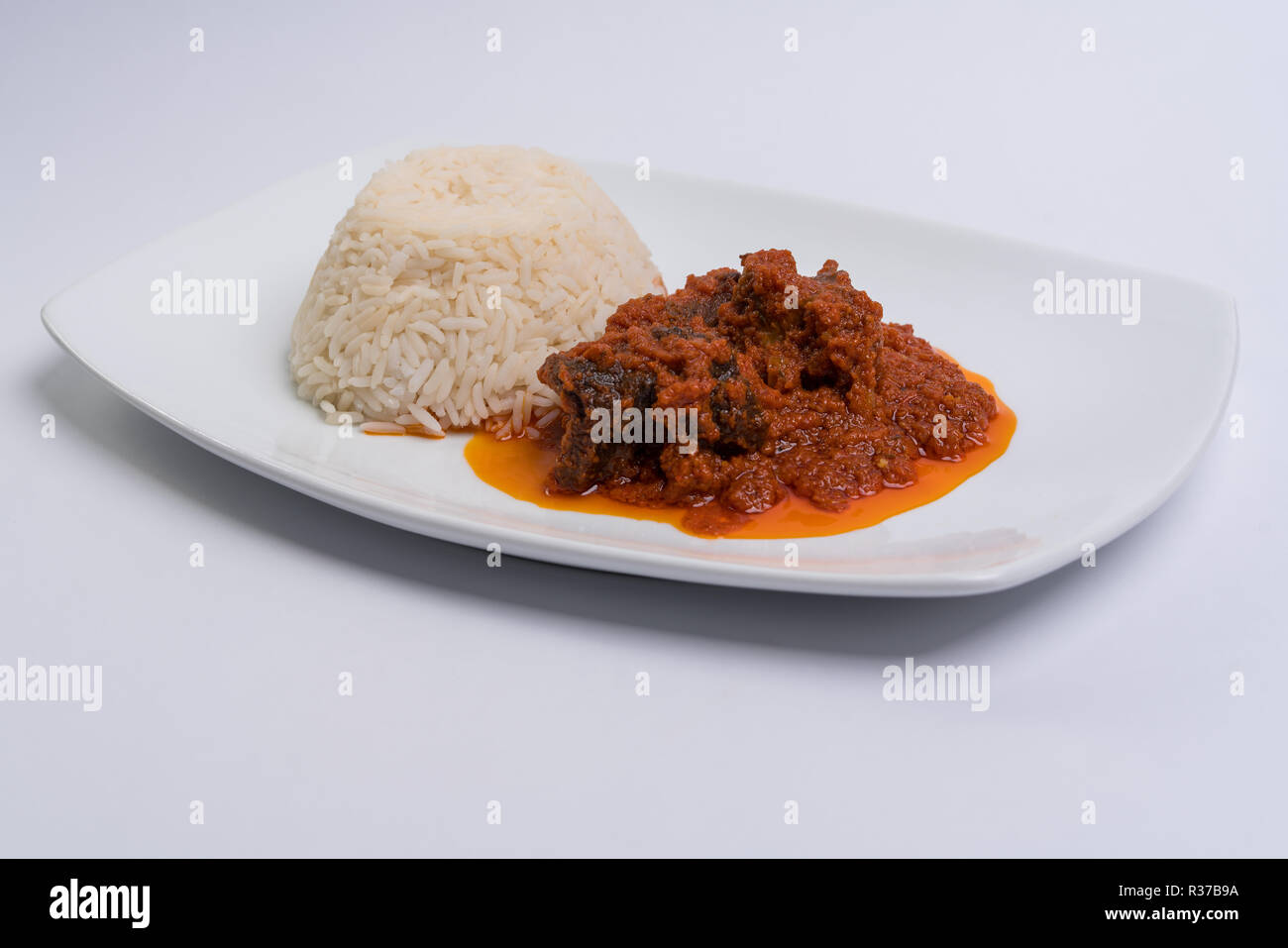 Rice and stew Stock Photo Alamy