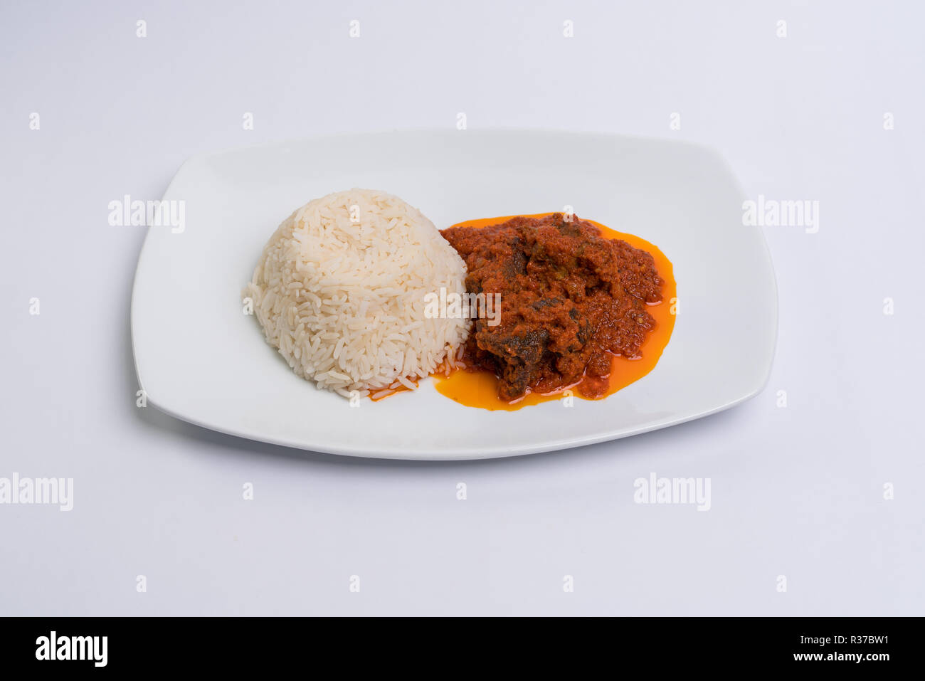 Rice and stew Stock Photo Alamy