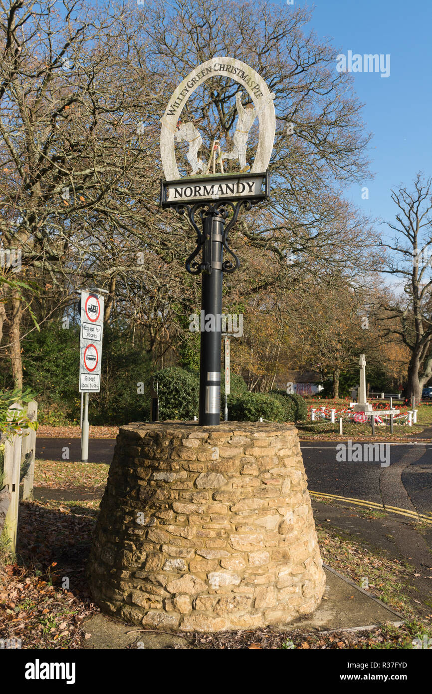 Village sign in the village of Normandy in Surrey, UK, also