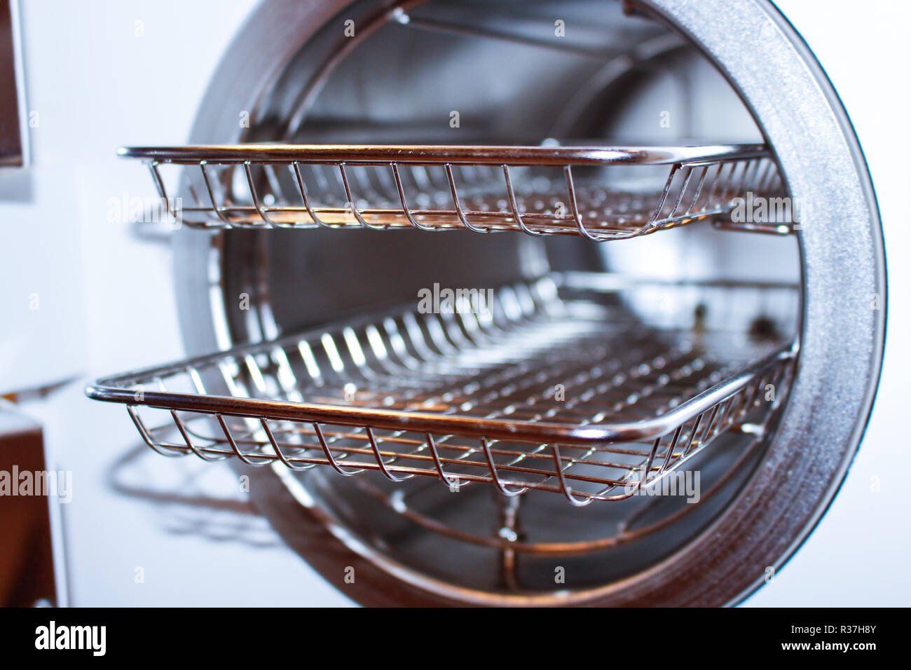 Sterilizing medical instruments in autoclave. Equipment for sterile cleaning of working medical