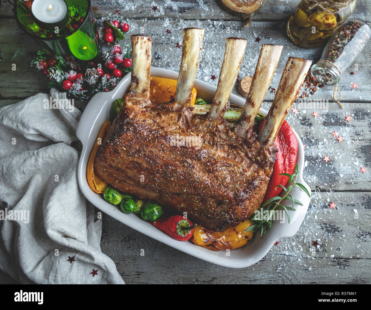 Veal Rack Chops Grilled roasted rack of veal lamb chops with vegetables in ceramic ...
