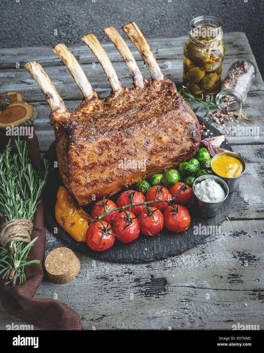 Veal Rack Chops Grilled roasted rack of lamb,veal chops with vegetables Stock Photo - Alamy