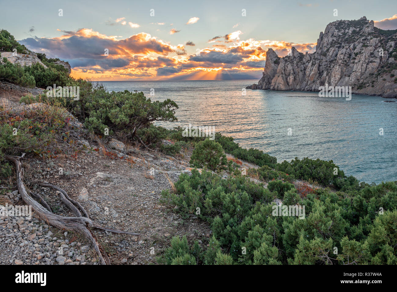 Sunset scene over rocky coastline hi-res stock photography and images ...